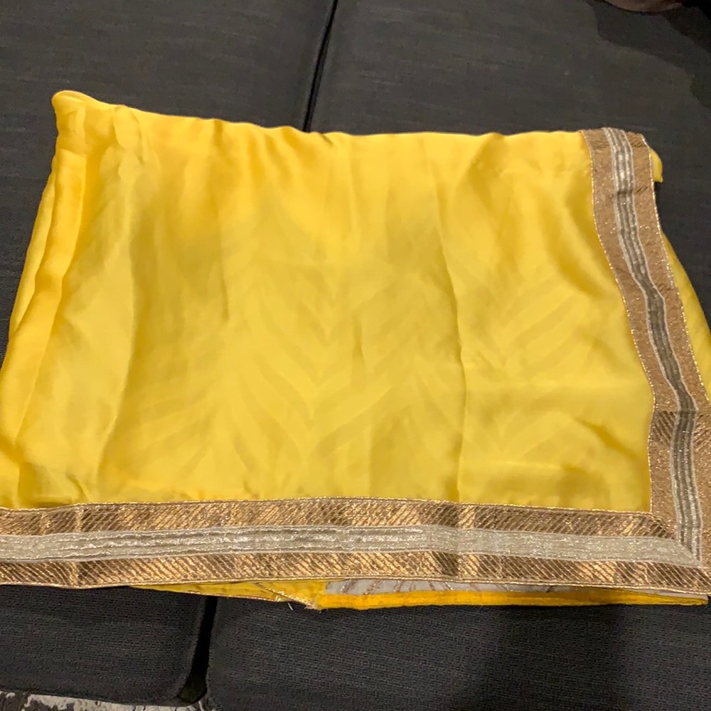 Yellow and white saree